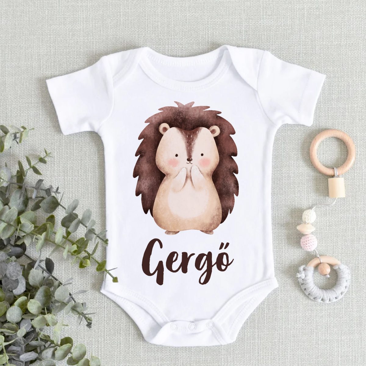 Mosolygó sünis gyerek body saját névvel